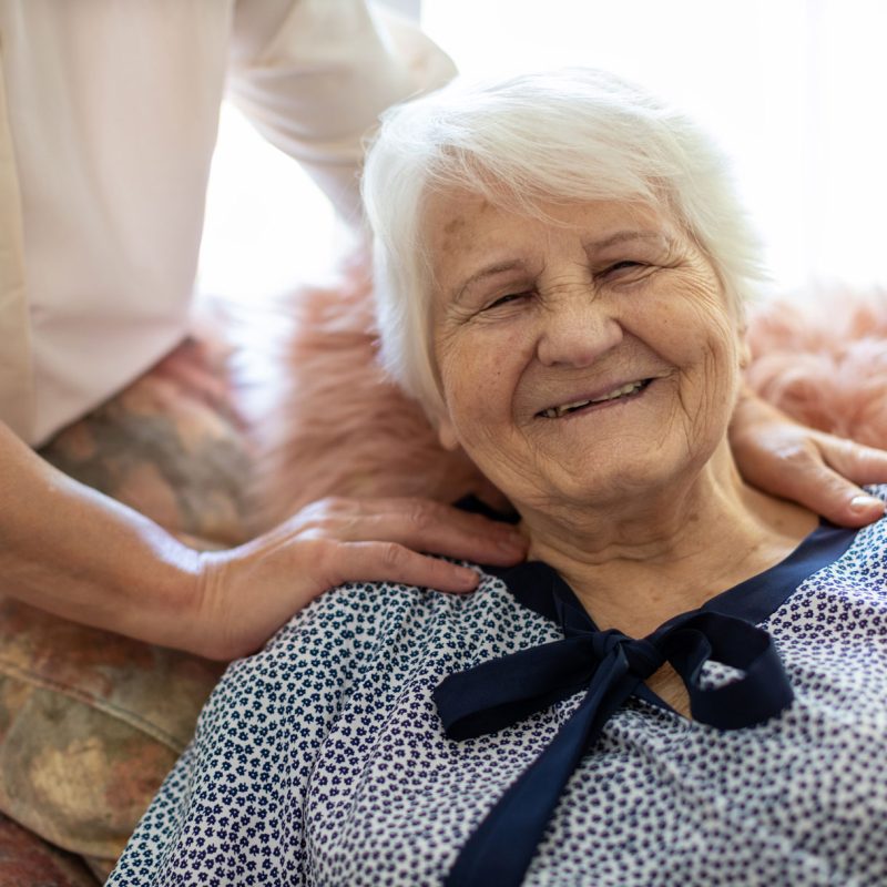 Happy grandmother at nursing home