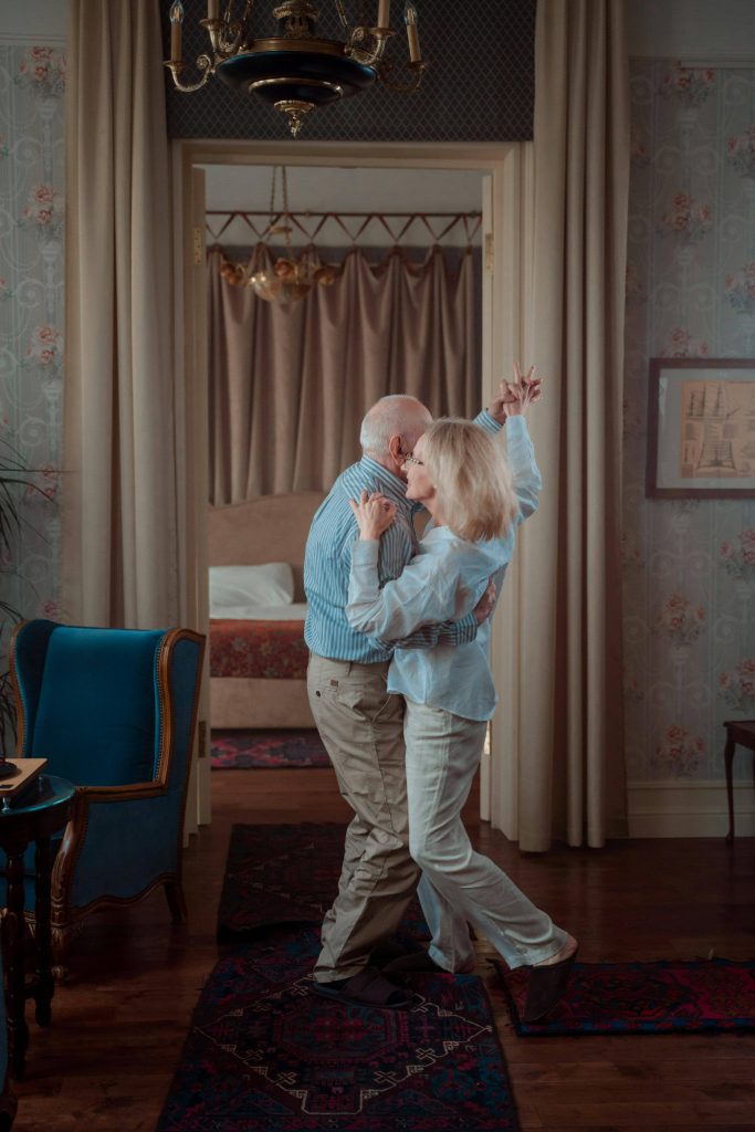 Seniors dancing at home